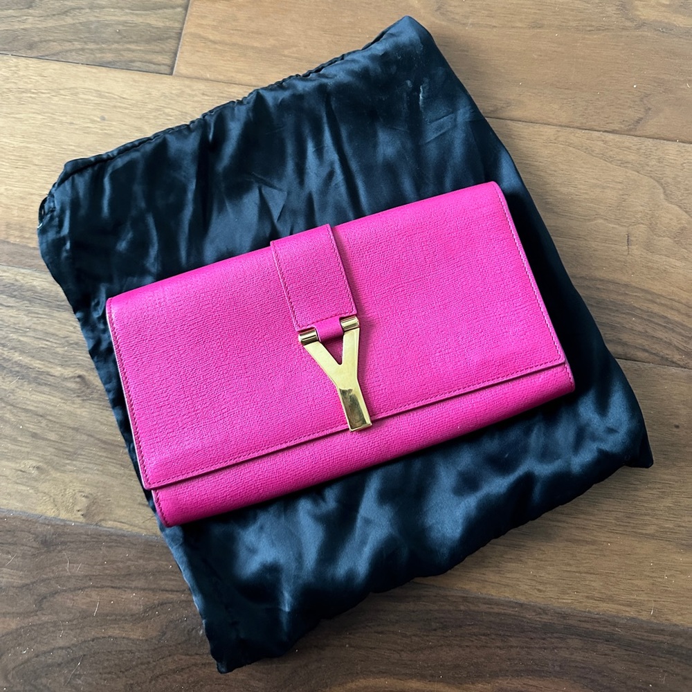 YSL hot pink clutch with gold buckle